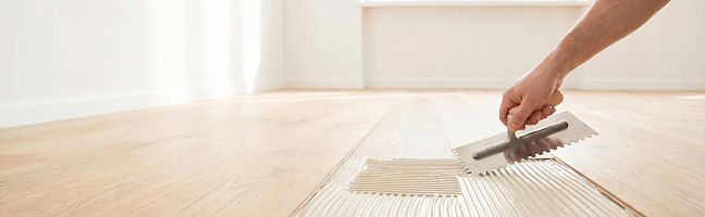 Обзор клеев для напольных покрытий Ceresit